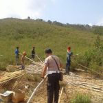 Polsek Badau Gelar Kerja Bakti Di Bukit Lilangan Desa Ibul