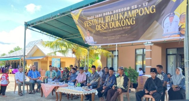 Anggota Koramil 414-03/Gantung, Sertu Wawan Hadiri Hari Jadi Desa Dukong ke-17 Sekaligus Sosialisasi Penerimaan TNI AD
