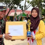 Babinsa Simpang Pesak Jadi Juri Lomba PBB Antar Kelas di SMPN 1 Simpang Pesak