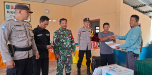 Sertu I Kadek Edi P Monitoring Kegiatan Wabup Tinjau TPS dan Penyaluran Logistik di Pelepak Pute