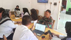 Babinsa Simpang Tiga Sertu Ramlan Hadiri Rapat Rencana Perubahan APBDes 2026